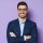 business-male-isolated-on-purple-background-9D2UWG3